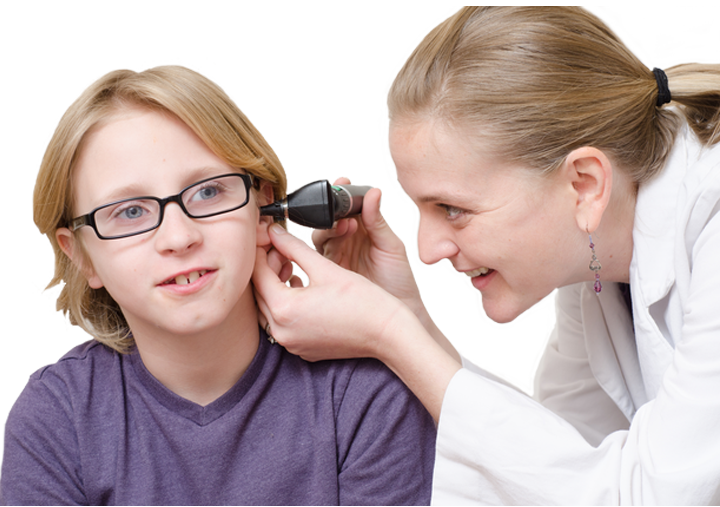 Doctor looking in childs ear